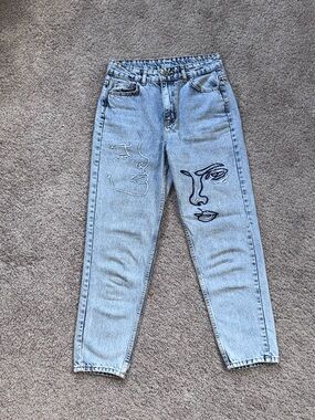 Light Wash Embroidered Face Motif Women’s Jeans